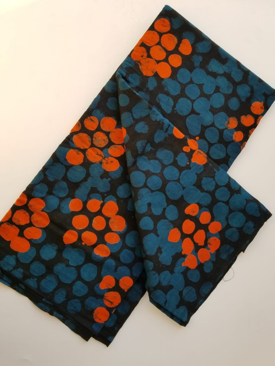 Blue and Orange dotted Batik fabric