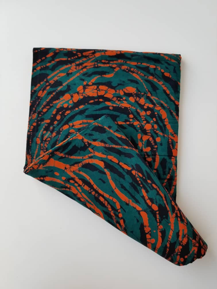 Green and Orange Circular Printed Batik Fabric