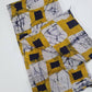 White, Mustard and Black Squared Fabric