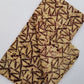 Cream and Brown Triangle Zip like printed Batik Fabric