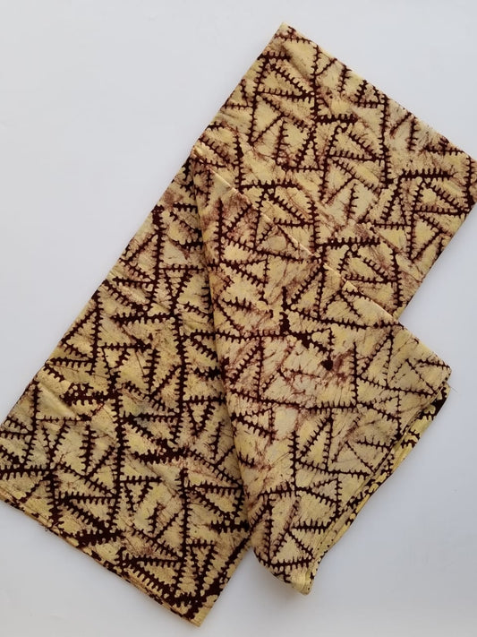 Cream and Brown Triangle Zip like printed Batik Fabric