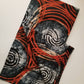 Grey And Orange Circled Batik Fabric